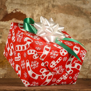 Complimentary Gift Wrap:  Candy Canes & Snowflakes